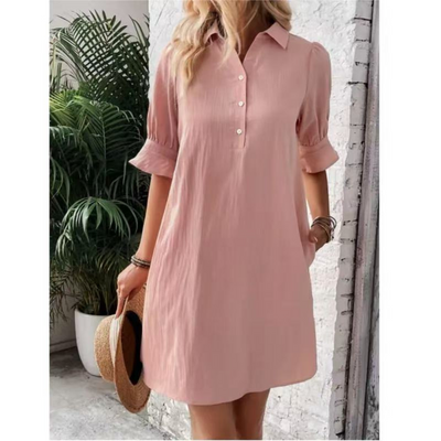 Chic tunic-style top with an elegant length Dress